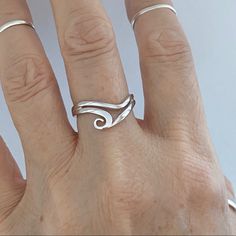 Sterling Silver Swirly Wave Ring, Surf Ring, Boho Ring, Silver Ring, Ocean Ring, Beach Ring, 925 Stamped Face Height: 9 Mm Finish: Rhodium Plated Material: 925 Sterling Silver Adjustable Wavy Sterling Silver Jewelry, Everyday Silver Jewelry With Wavy Shape, Everyday Silver Jewelry With Wavy Design, Adjustable Silver Wavy Rings, Everyday Silver Wavy Jewelry, Adjustable Sterling Silver Wavy Rings, Sterling Silver Swirl Rings For Gift, Silver Swirl Rings For Gifts, Silver Swirl Rings As Gift