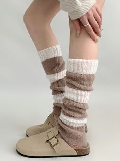 Stay cozy and stylish with our 3 color options knit leg warmers. These versatile leg warmers come in three beautiful colors to match any outfit. Whether you're pairing them with boots, leggings, or skirts, these leg warmers are the perfect accessory to complete your look.   Please note that this product includes one pair of leg warmers only. Choose your favorite color and step up your fashion game with these trendy leg warmers. Cozy Elastic Leg Warmers For Fall, Thigh High Cozy Leg Warmers, Cozy Thigh-high Leg Warmers, Cozy Thigh High Leg Warmers, Warm Acrylic Socks For Fall, Thick Acrylic Socks For Fall, Elastic Knit Leg Warmers For Fall, Cozy Beige Knee-high Socks For Winter, Comfortable Thigh-high Leg Warmers For Fall