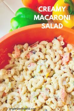 creamy macaroni salad in an orange bowl