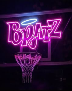 a neon sign that says brazz above a basketball hoop