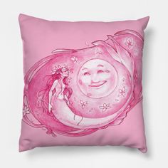 a pink pillow with a drawing of a smiling girl on it's face and the moon above her head