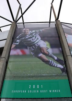 an advertisement for the european golden boot winner is displayed on a building's side