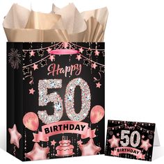 a birthday bag with the number 50 on it and a card for someone's 50th