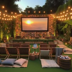 an outdoor movie theater with chairs and lights