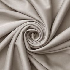 an up close shot of the fabric in light grey color, with very thin folds