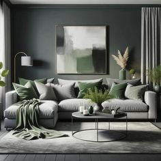 a living room with grey walls and green pillows on the couch, coffee table and rug