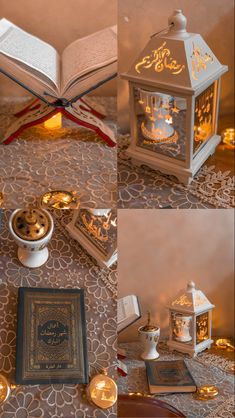 an open book sitting on top of a table next to candles