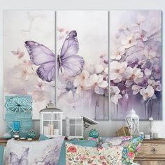 three purple butterflies flying over flowers on a white and pink background with blue accents in the foreground