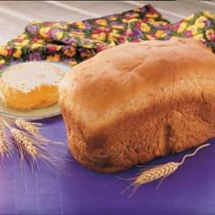 a loaf of bread sitting on top of a purple table