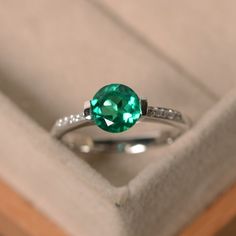 Emerald engagement ring brilliant cut May birthstone by LuoJewelry Fine Jewelry Emerald Promise Ring, Emerald Birthstone Ring With Brilliant Cut, Classic Emerald Promise Ring With Birthstone, Emerald Ring With Brilliant Cut For Promise, Round Emerald Birthstone Ring With Brilliant Cut, Emerald Ring Brilliant Cut May Birthstone, Emerald Ring For May Birthstone In Brilliant Cut, Classic Cubic Zirconia Emerald Promise Ring, Emerald Ring Brilliant Cut For May Birthstone