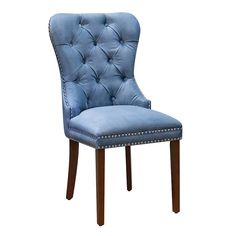 a blue upholstered chair with studding on the back and legs, against a white background