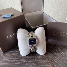 Brand New Gucci Bracelet Watch. Comes With Original Box, Tags & Authenticity Card. Beautiful Christmas Gift For That Special Lady Modern Gucci Jewelry With Round Dial, Elegant Gucci Watch With Rectangular Dial, Luxury Silver Gucci Watch, Timeless Gucci Watch As Gift, Timeless Gucci Watch As A Gift, Gucci Jewelry With Bracelet Strap For Gift, Gucci Watches With Diamond Hour Markers, Gucci Watches With Diamond Hour Markers As Gift, Gucci Analog Watch Gift