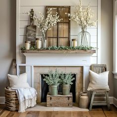 a living room filled with furniture and a fire place covered in flowers on top of a mantle