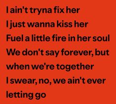 an orange background with the words i am tryna fix her just wanna kiss her fuel a little fire in her soul