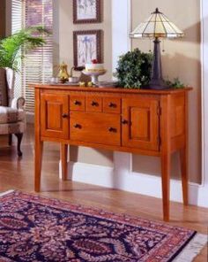 a living room scene with focus on the dresser