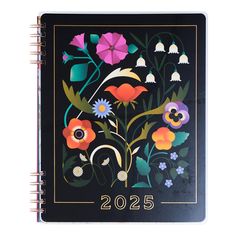 a black notebook with colorful flowers on it