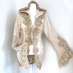 Handmade Lace cardigan, wedding jacket. RawRags delicate long bridal coat unique handmade wedding lace cardigan . I really loved making this unique  lace bridal coat , I was thinking of a fairy wedding queen , walking at the beach or in the magical forest. We all Dream of a beautiful fairytale wedding with feminine clothing and accessories .  My handmade wedding lace cardigan , is made with a long cotton  body  covered in laces and applications at the edges . It's a ready made one of a kind whic Long Fall Wedding Outerwear, Elegant Long Cream Cardigan, Cream Cardigan For Fall Wedding, Cream Wedding Cardigan For Fall, Fall Wedding Cream Cardigan, Long Fitted Cream Cardigan, Bohemian Long Sleeve Outerwear For Wedding, Elegant Cream Cardigan For Wedding, Bohemian Long Sleeve Wedding Outerwear