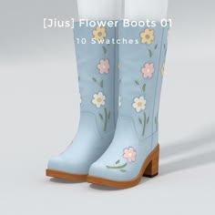 a pair of blue boots with flowers painted on them and the words just flower boots off