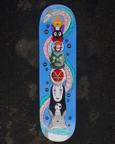 a skateboard with some artwork on it