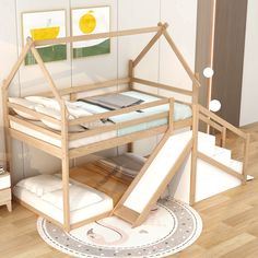 there is a bunk bed with slide in the middle and stairs up to it's bottom