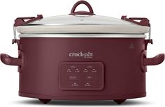 the crock pot is on display with its lid open