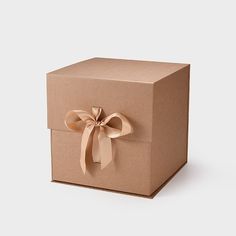 a brown box with a bow on it