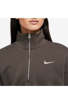 A roomy fit and cropped hem define this cozy half-zip sweatshirt with a brushed-fleece interior that's perfect for chillier days. 19" length (size Medium) Half-zip closure Stand collar Ribbed cuffs 80% cotton, 20% polyester Machine wash, tumble dry Imported Nordstrom x Nike: A curated lifestyle destination where fashion is the ultimate sport Sports Half-zip Fleece Sweatshirt, Sportswear Fleece Half-zip Top, Half-zip Sportswear Sweatshirt For Fall, Half-zip Sweatshirt For Sports In Fall, Sporty Half-zip Fleece Top, Sporty Fleece Sweatshirt With Funnel Neck, Nike Half-zip Winter Top, Nike Winter Half-zip Top, Sporty Fleece Half-zip Sweatshirt