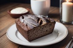 a loaf of bread sitting on top of a white plate