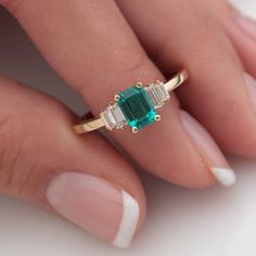 🎁We have extended our returns and exchange policy: Contact Us within 14 days of delivery Ship items back within 30 days of delivery Art deco emerald engagement ring, 1-carat emerald, colombian lab-grown 7x5mm & 4 Moissanite Baguette 0.50 ctw, 14k gold unique GioielliRings design makes a regal statement that is bound to become a family heirloom. MORE INFORMATION ❥ The craft period is about 10-14 business days. ❥ Free shipping via DHL ❥ Available in a combination of 14K Rose Gold, 14K Yellow Green Moissanite Emerald Ring With Baguette Cut, Gia Certified Baguette Cut Emerald Ring In 14k Gold, Art Deco Emerald Engagement Ring, Green Emerald Cut Emerald Ring With Baguette Diamonds, Baguette Cut Emerald Ring For May Birthstone, Emerald Cut Emerald Ring With Baguette Diamonds For Anniversary, Elegant Emerald Cut Emerald Ring With Baguette Diamonds, Elegant Emerald Cut Ring With Baguette Diamonds, Emerald Cut Emerald Ring With Baguette Diamonds