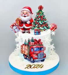 a christmas cake with santa clause and presents on top