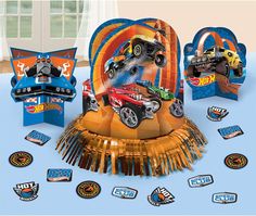 an assortment of hot wheels party supplies including pinatas, napkins and decorations