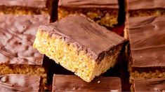 chocolate and peanut butter bars stacked on top of each other