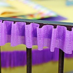 a close up of a cake with purple icing on it