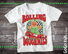 'Rolling with my Doughmies' Retro Style Christmas shirt for girls. Available is sizes 0-3 Month to Youth 14-16. See photos for size chart. This shirt is made of 100% polyester but has the look and feel of cotton.  CARE INSTRUCTIONS - Turn Garment Inside Out - Machine Wash Cold with Mild Detergent - No Bleach - No Fabric Softener - Cool or Air Dry PRODUCTION TIME & SHIPPING * The production time for your order is estimated at 1-2 business days. * All orders are dispatched via USPS Ground Advantag Retro Christmas Shirt, T Shirts For Girls, Christmas T Shirts, Funny Christmas Shirts, Fabric Softener, Retro Christmas, Funny Christmas, Kids Tops, Christmas Shirt