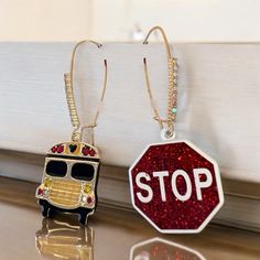 Add A Touch Of Fun To Your Outfit With These Betsey Johnson School Bus & Stop Sign Rhinestone Drop Earrings. These Earrings Feature A Unique Design With A School Bus And Stop Sign Shape, Perfect For Any Occasion. The Earrings Are Made With A Multi-Tone Gold Plated Metal And Have A Hook Closure For Easy Wear. The Rhinestone Stones Are Multicolored, Adding A Pop Of Color To Your Ensemble. These Earrings Are Signed By The Designer And Have A Pav Setting Style. They Measure 2.5 Inches In Length And Bus Stop Sign, Crystal Heart Earrings, Betsey Johnson Earrings, Stop Sign, Alloy Earrings, Black Gift Boxes, Betsey Johnson Jewelry, Large Hoop Earrings, Bus Stop