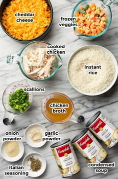 ingredients to make chicken broth laid out on a marble counter top with text overlay