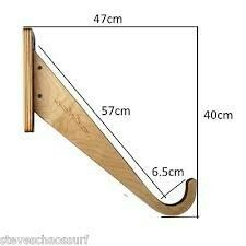 a wooden shelf bracket with measurements for the top and bottom, shown on a white background