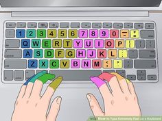 two hands typing on a keyboard with colored letters and numbers in the keypads