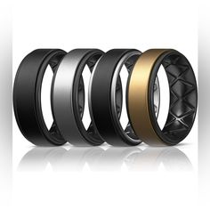 four different types of wedding rings with black and gold inlays on each side