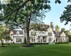 a large white house with lots of windows