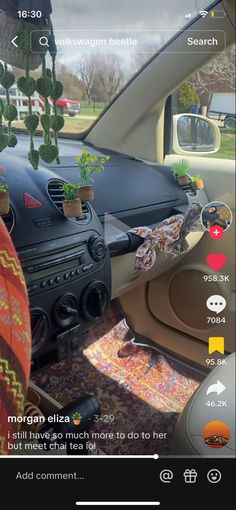 an image of the inside of a car with various items in it and on the dashboard