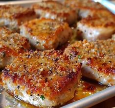 some meat is sitting in a pan on the table