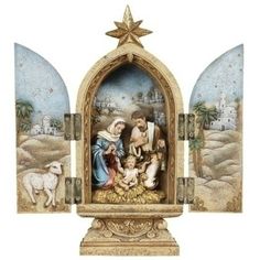 the nativity scene is displayed in an ornate frame