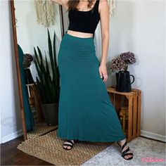 Qteee - Elegance Defined: High-Waisted Flared Maxi Skirt with Bell Checkered Design and Floor-Length Hemline Casual Fitted Solid Color Maxi Skirt, Casual Green Full-length Maxi Skirt, Casual Green Maxi Skirt, Casual Stretch Full Length Maxi Skirt, Stretch Casual Maxi Skirt, Casual Stretch Full-length Maxi Skirt, Casual Stretch Solid Color Maxi Skirt, Flare Maxi Skirt, Checker Design