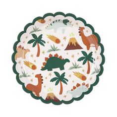 a paper plate with dinosaurs and palm trees on the front, against a white background