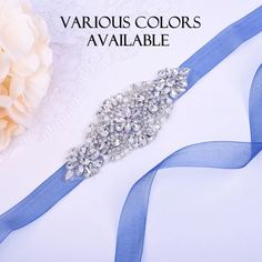 This Is A Brand New Wedding Sash Made Out Of Satin And Crystals. The Fancy Design Is Approximately 5-1/2" X 2" (14cm X 5cm) Large And The Satin Ribbon Is 106" (270cm) Long X 3/4" (2cm) Wide. The Sash Is Brand New, Never Worn Before. Perfect Condition. Style 016 Blue Wedding Dress With Sashes, Elegant Blue Sashes For Wedding, Dress Coverup Ideas, Wedding Dress Sash, Fancy Design, Elegant Branding, Dress Sash, Wedding Sash, Satin Bow