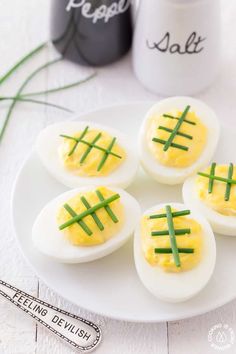 game time deviled eggs on a white plate