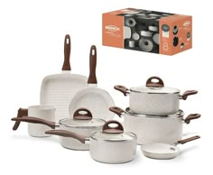 an assortment of pots and pans are shown in front of a box with utensils