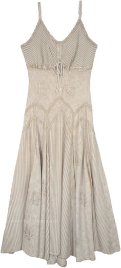 A summer maxi dress in beige with lace details around the neckline and hem, this sleeveless dress has vertical panels that add flair and feminine flow to it.  The front of the dress has a tie-up lace style. #tlb #Sleeveless #SummerDress #westerndress #renaissancedress #medievaldress Loungewear Dress, Ankle Length Dress, Trendy Skirts, Sleeveless Dress Summer, Lightweight Dress, Beige Dresses, Versatile Dresses, Lace Fashion, Western Dresses