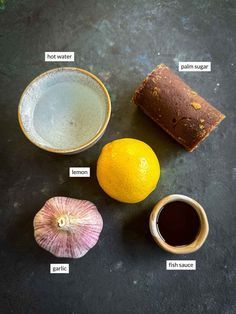 the ingredients to make this recipe include lemon, garlic, and brown sugar on a black surface